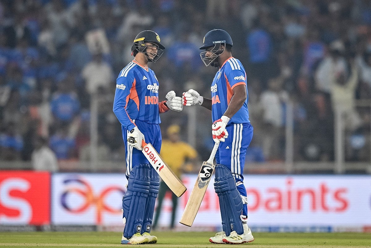 India's Abhishek Sharma (L) and Sanju Samson.