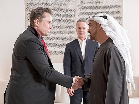 President His Highness Sheikh Mohamed bin Zayed Al Nahyan greets Elon Musk, CEO of Tesla and CEO of SpaceX, before a meeting at Zayed National Museum.