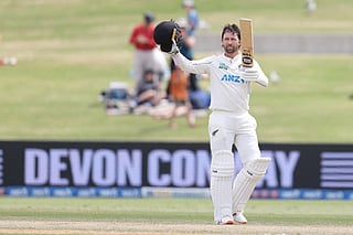 New Zealand’s Devon Conway celebrates his century during day four of the 3rd international Test cricket match between New Zealand and West Indies at Bay Oval in Mount Maunganui on December 21, 2025.