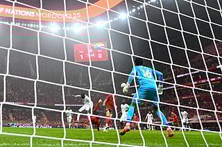 Morocco's forward #20 Ayoub El Kaabi (C) scores a goal during the Africa Cup of Nations (CAN) group A football match between Morocco and Comoros at Prince Moulay Abdellah Stadium in Rabat on December 21, 2025.