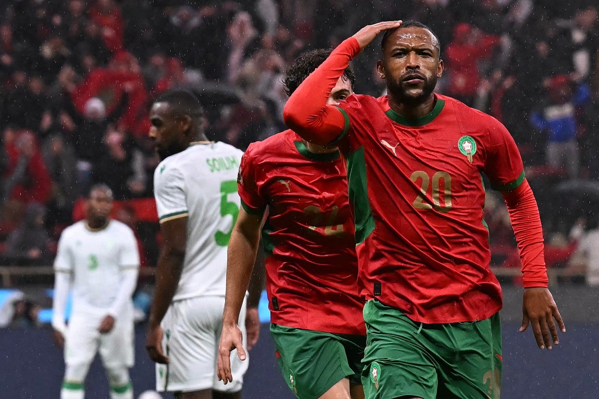 Morocco's forward #20 Ayoub El Kaabi celebrates his goal during the Africa Cup of Nations (CAN) group A football match between Morocco and Comoros at Prince Moulay Abdellah Stadium in Rabat on December 21, 2025.