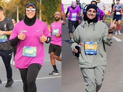 Azza Alghunaimi and Khawla Al Marzouqi in action during the ADNOC Abu Dhabi Marathon.