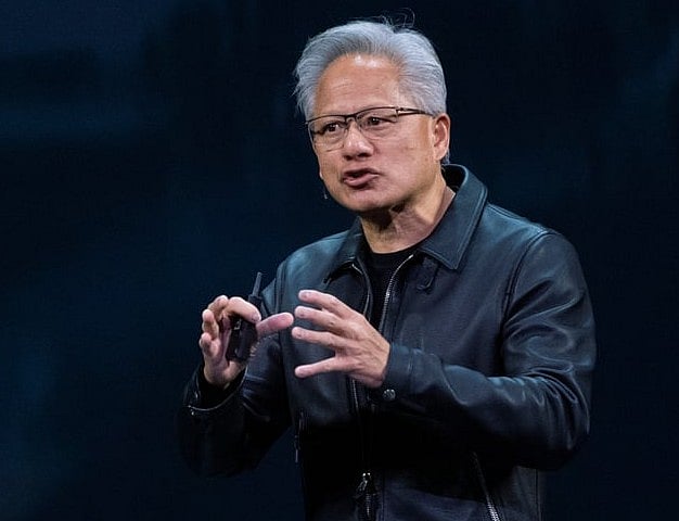 NVIDIA CEO Jensen Huang speaks on how AI infrastructure and AI factories that generate intelligence at scale are powering a new industrial revolution, at Washington Convention Center, Tuesday, Oct. 28, 2025, in Washington.