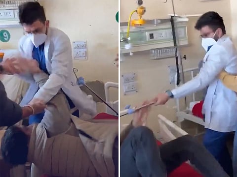 The footage shows Dr Raghav Narula seizing an iron rod from a patient before striking him.