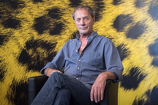 Palestinian actor Mohammed Bakri poses during the photocall for the film "Wajib" at the 70th Locarno International Film Festival in Locarno, Switzerland, on Aug. 5, 2017. 