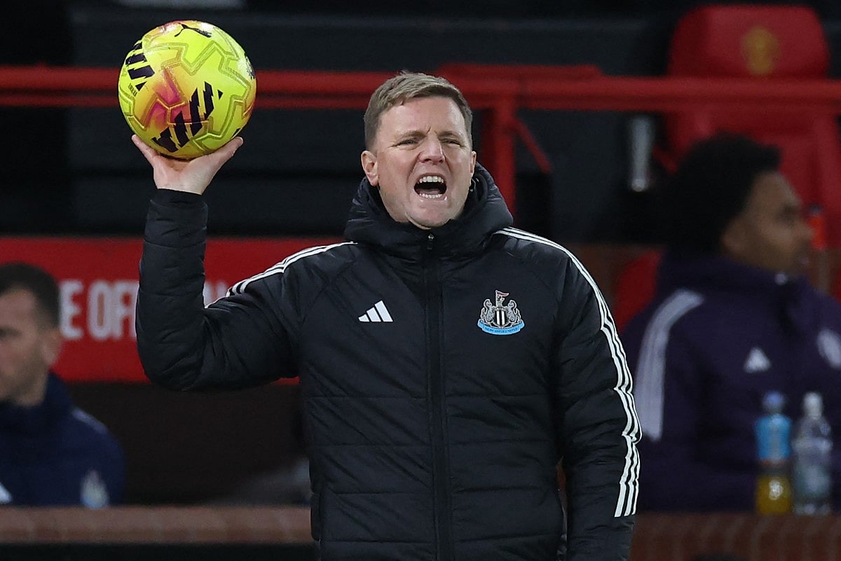 Newcastle United's English head coach Eddie Howe returns the ball during the English Premier League football match between Manchester United and Newcastle United at Old Trafford in Manchester, north west England, on December 26, 2025.