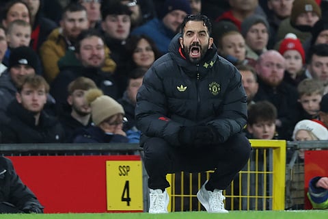 Manchester United's Portuguese head coach Ruben Amorim gestures on the touchline during the English Premier League football match between Manchester United and Newcastle United at Old Trafford in Manchester, north west England, on December 26, 2025.