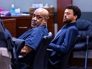 Duane Davis, left, looks back during a hearing on claims of juror misconduct in his jailhouse battery case at the Regional Justice Center, July 2, 2025, in Las Vegas. 