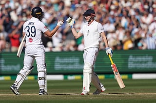 England's Harry Brook (R) and Jamie Smith celebrate after hitting the winning runs during the second day of the fourth Ashes Test against Australia at the Melbourne Cricket Ground (MCG) in Melbourne on December 27, 2025.