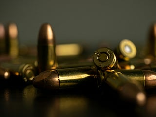 The weapon used was a military-grade rifle.