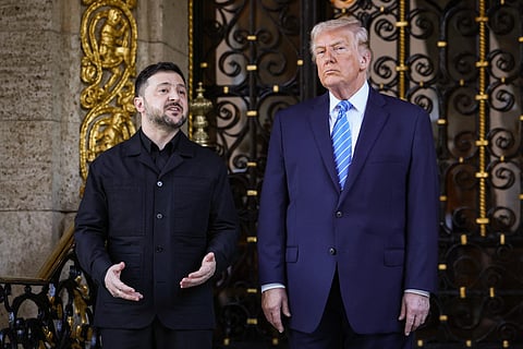 Ukrainian President Volodymyr Zelensky is greeted by US President Donald Trump at Trump’s Mar-a-Lago club on December 28, 2025 in Palm Beach, Florida.