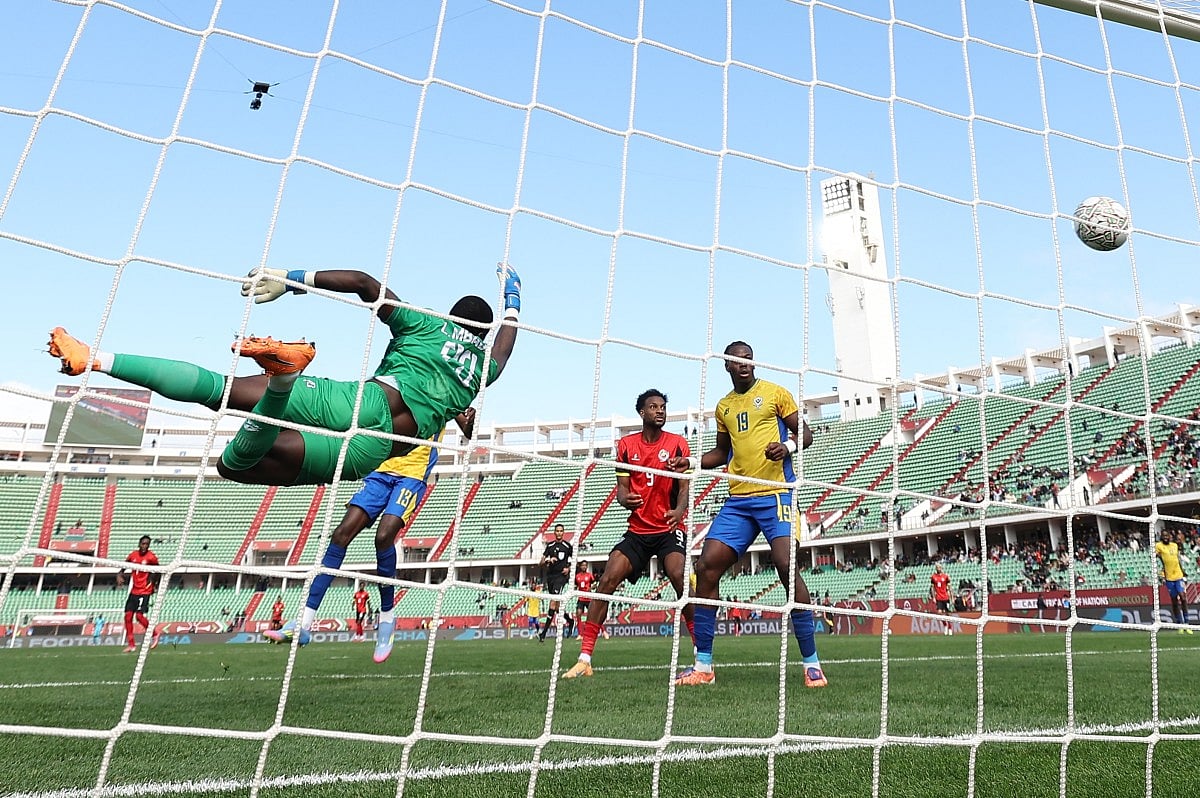 Gabon's goalkeeper Loyce Mbaba concedes a goal during the Africa Cup of Nations Group F football match against Mozambique at Grand Stadium in Agadir on December 28, 2025.