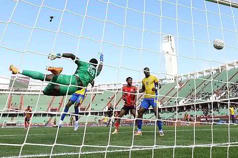 Gabon's goalkeeper Loyce Mbaba concedes a goal during the Africa Cup of Nations Group F football match against Mozambique at Grand Stadium in Agadir on December 28, 2025.