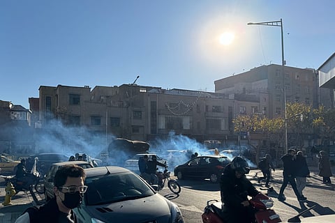 Shopkeepers and traders protest in the street against the economic conditions and Iran's embattled currency in Tehran on December 29, 2025.
