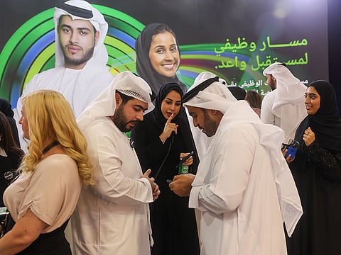 Emiratis on the opening day of Ru'ya Careers UAE Redefined 2023 job fair at Dubai World Trade Centre. 
