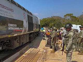 Mexican Army soldiers and Civil Protection members rescue passengers from the Interoceanic train that derailed in the Asunción Ixtaltepec area on the route to Oaxaca, Mexico.