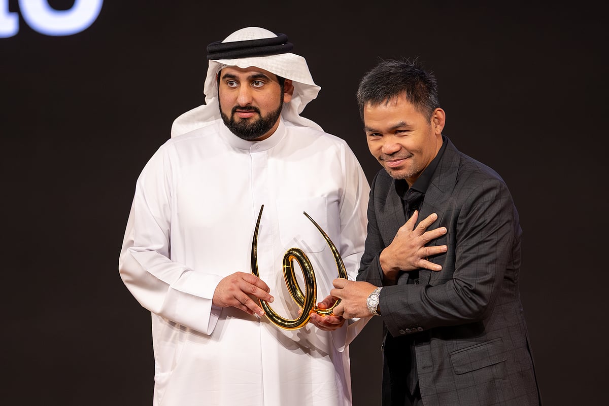 Sheikh Ahmed Bin Mohammed Bin Rashid Al Maktoum, Second Deputy Ruler of Dubai and Chairman of the Dubai Media Council presenting the award to legendary Filipino boxer Manny Pacquiao on the opening day of World Sports Summit in Dubai on Monday.