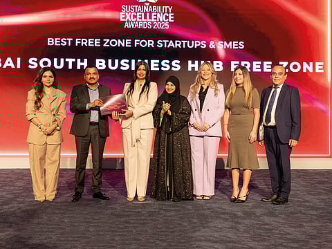 Hassna Fadel, COO, Dubai South Business Hub Free Zone, receives the Best Free Zone for Startups & SMEs award from Captain Pradeep Singh, Founder and Chairman, Karma Developers, in the presence of Saska Macnab, Client Experience Manager, Christy El Khoury, Project Coordinator, Dr Habiba Al Marashi, Co-Founder and Chairperson, Emirates Environmental Group, Aparna Bajpai, Founder, BeingShe, and Vijay Vaghela, CEO, Gulf News