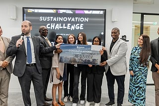 Sustainovation Challenge winners receiving their awards from organisers, DMU Dubai and Ehfaaz 