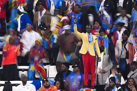 Watch: Congolese football fan stands still for 90 minutes like a statue