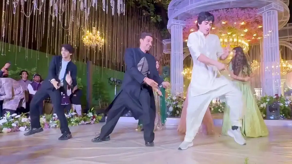 Hrithik Roshan, Bollywood's answer to effortless cool, was caught on camera absolutely owning the dance floor at a family wedding and bringing his sons along for the ride.