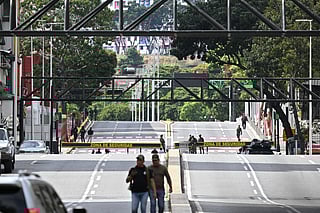 View of a security zone outside the Miraflores presidential palace in Caracas on January 3, 2026, after US forces captured Venezuela's President Nicolas Maduro.