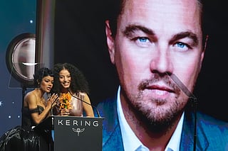 Teyana Taylor, left, and Chase Infiniti accept the desert palm achievement award on behlaf of Leonardo DiCaprio during the 37th Palm Springs International Film Festival Film Awards on Saturday, Jan. 3, 2026 at Palm Springs Convention Center in Palm Springs, California.