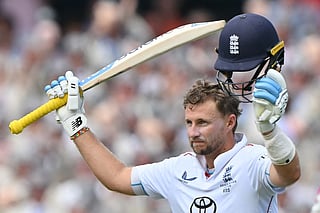 England’s Joe Root celebrates reaching his century (100-runs) on day two of the fifth Ashes cricket Test match between Australia and England at the Sydney Cricket Ground (SCG) in Sydney on January 5, 2026.
