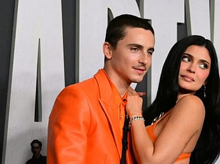 French actor Timothee Chalamet (L) and US media personality Kylie Jenner attend the premiere of "Marty Supreme" in Los Angeles, California, on December 8, 2025.