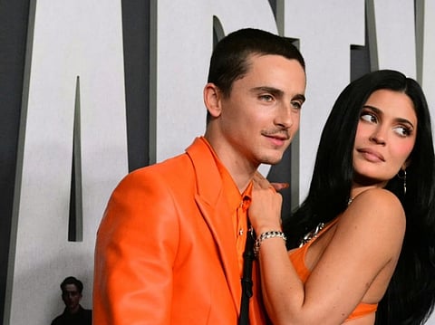 French actor Timothee Chalamet (L) and US media personality Kylie Jenner attend the premiere of "Marty Supreme" in Los Angeles, California, on December 8, 2025.