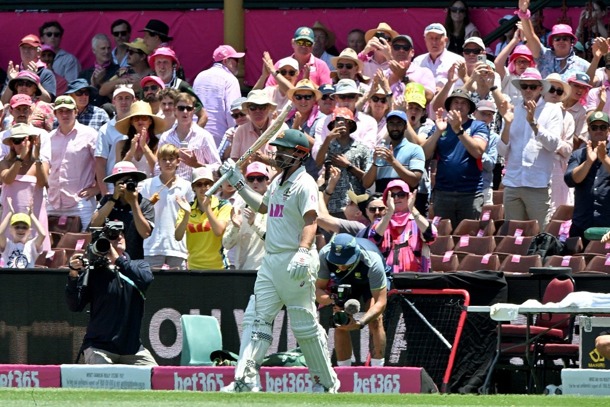 Spectators applaud Australia’s Travis Head as he walks off the field after scoring 163 runs on the day three of the fifth Ashes cricket Test between Australia and England at the Sydney Cricket Ground in Sydney on January 6, 2026.