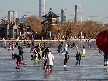 Beijing’s frozen lakes turn into bustling winter playgrounds