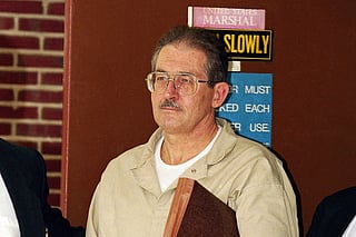 FILE - Former CIA agent Aldrich Ames leaves federal court after pleading guilty to espionage and tax evasion conspiracy charges April 28, 1994, in Alexandria, Virginia.