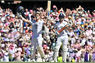 England’s Jacob Bethell celebrates reaching his century (100-runs) on day four of the fifth Ashes cricket Test between Australia and England at the Sydney Cricket Ground in Sydney on January 7, 2026.