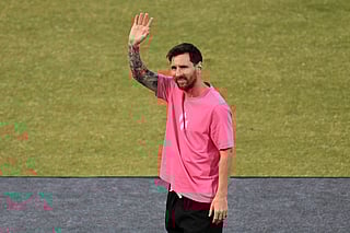 Argentinia's soccer star Lionel Messi waves to fans during his India tour in New Delhi, India, Monday, Dec. 15, 2025. (AP Photo)