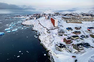 Snow-covered buildings in Nuuk, Greenland. US President Donald Trump is discussing options including military action to take control of Greenland.