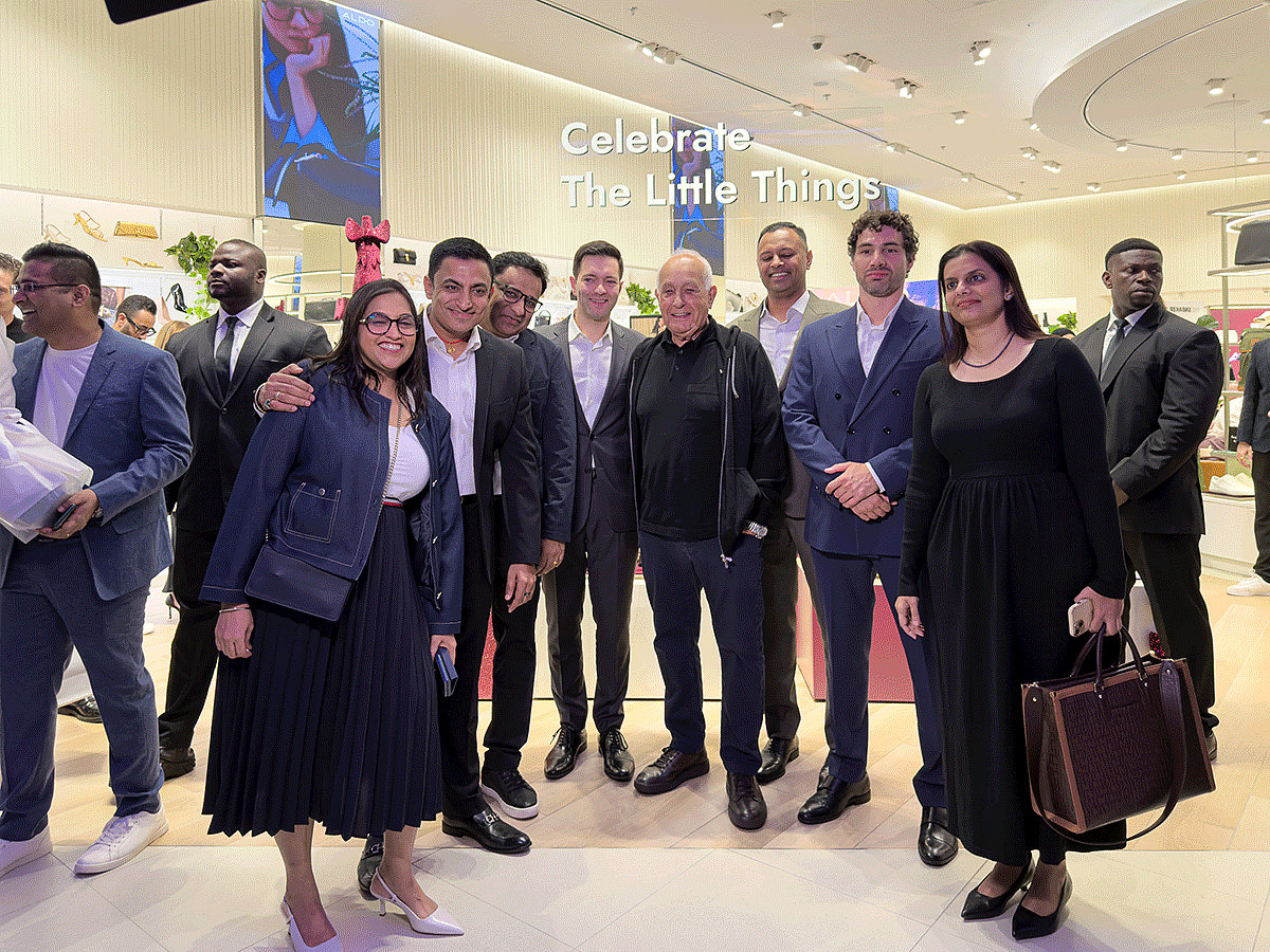 Aldo Bensadoun (C) with his Dubai team at the ALDO store in Dubai Mall. 