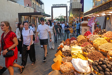 Tourists in the old part of Deira, Dubai. 