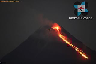 In this photo provided by the Philippine Institute of Volcanology and Seismology, lava flows from the crater of the Mayon volcano as alert level 3 remains raised in Albay province, north eastern Philippines on Wednesday Jan. 7, 2026. (Philippine Institute of Volcanology and Seismology via AP)