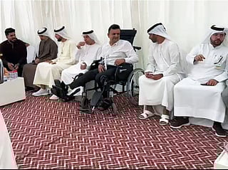 Still bearing injuries to his limbs from the accident, Abdul Latheef sat in a wheelchair with quiet dignity and accepted condolences and prayers. 