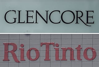This combination of file images made on January 8, 2026, shows (top) the logo of commodity trading and mining company giant Glencore in Baar on May 28, 2025; and (bottom) the logo of global mining and metals company Rio Tinto in Perth on November 24, 2025.