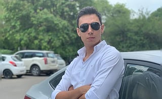 Coach booked after shooter files sexual harassment case