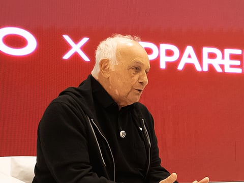 Aldo Bensadoun (C) with his Dubai team at the ALDO store in Dubai Mall. 