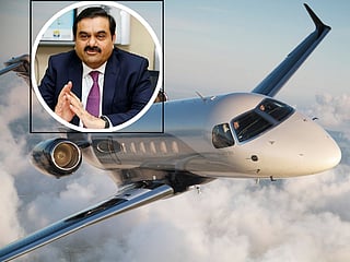 An Embraer business jet and Indian tycoon Gautam Adani (inset).