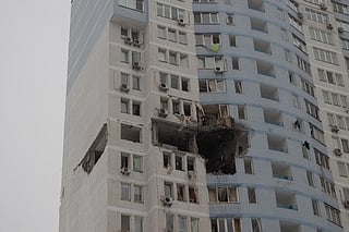 This photograph shows a damaged residential building following a Russian attack in Kyiv early on January 9, 2026, amid the Russian invasion of Ukraine.