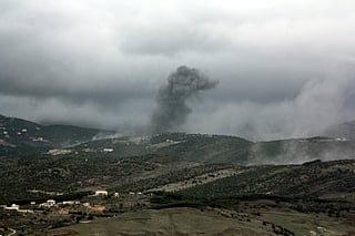 Smoke rises from the site of an Israeli airstrike that targeted the hilltops of the Al Rihane mountain in southern Lebanon on January 9, 2026.
