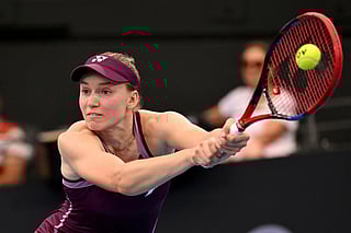 Elena Rybakina of Kazakhstan hits a return during her women's singles match against Karolina Muchova of the Czech Republic at the Brisbane International tennis tournament in Brisbane on January 9, 2026.