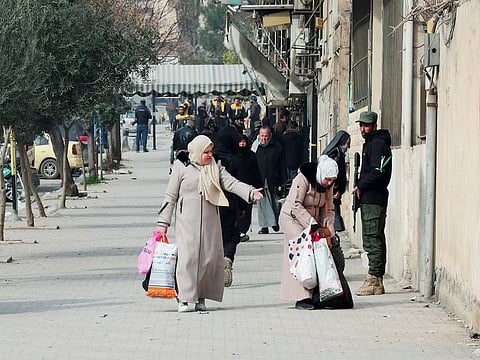 Civilians flee with their belongings after fresh clashes erupted between the Syrian army and the Syrian Democratic Forces in Aleppo, Syria.