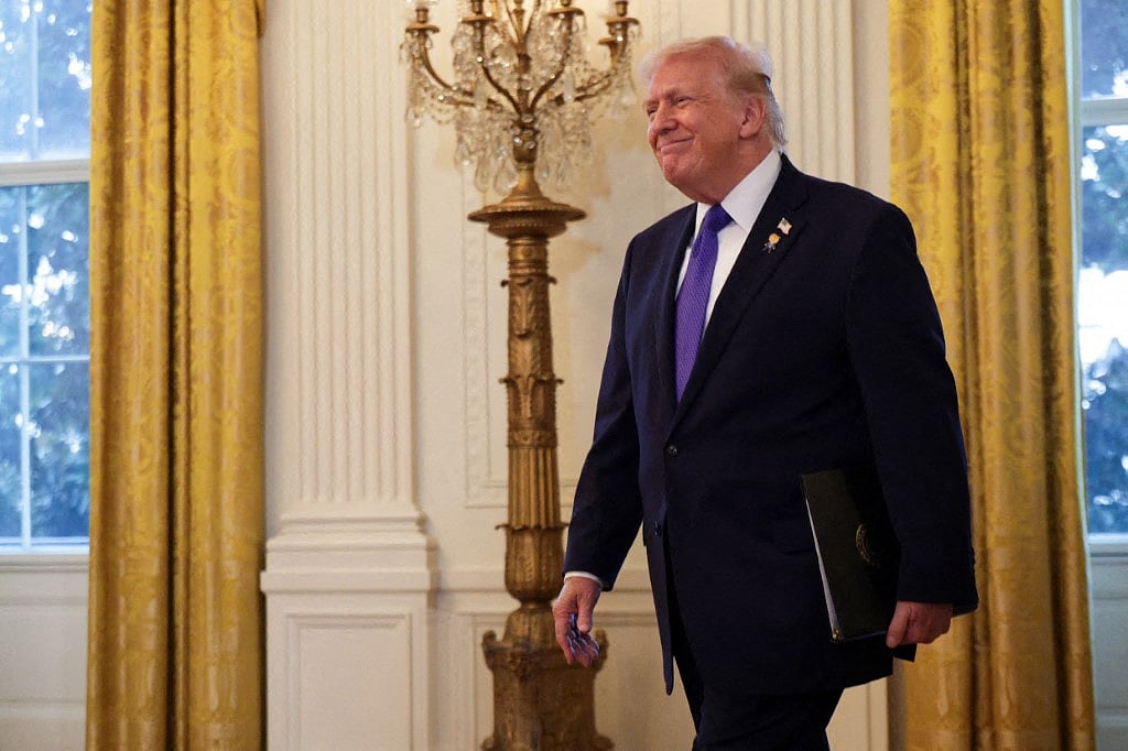 President Donald Trump arrives to a meeting with oil and gas executives in the East Room of the White House on January 9, 2026 in Washington, DC. Trump is holding the meeting to discuss plans for investment in Venezuela after ousting leader its leader Nicolás Maduro.