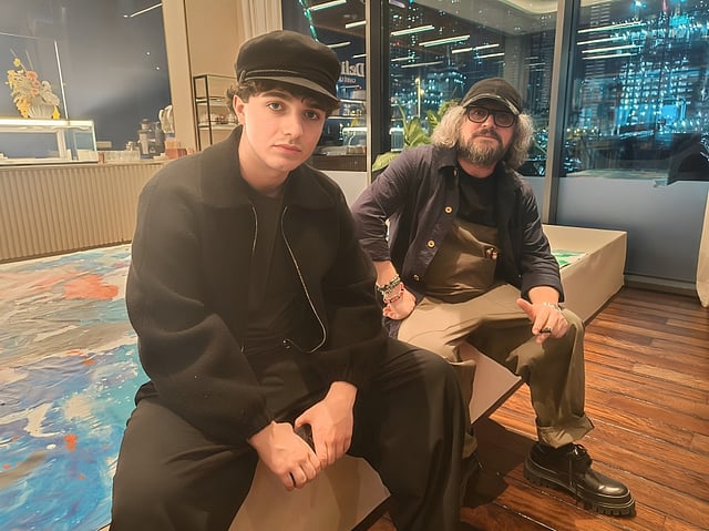 Artist Agron Hoti with his son Lorenc.